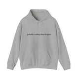 Probably reading about dragons... Hooded Sweatshirt