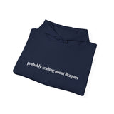 Probably reading about dragons... Hooded Sweatshirt