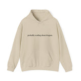 Probably reading about dragons... Hooded Sweatshirt