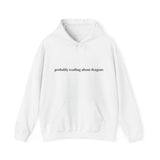 Probably reading about dragons... Hooded Sweatshirt